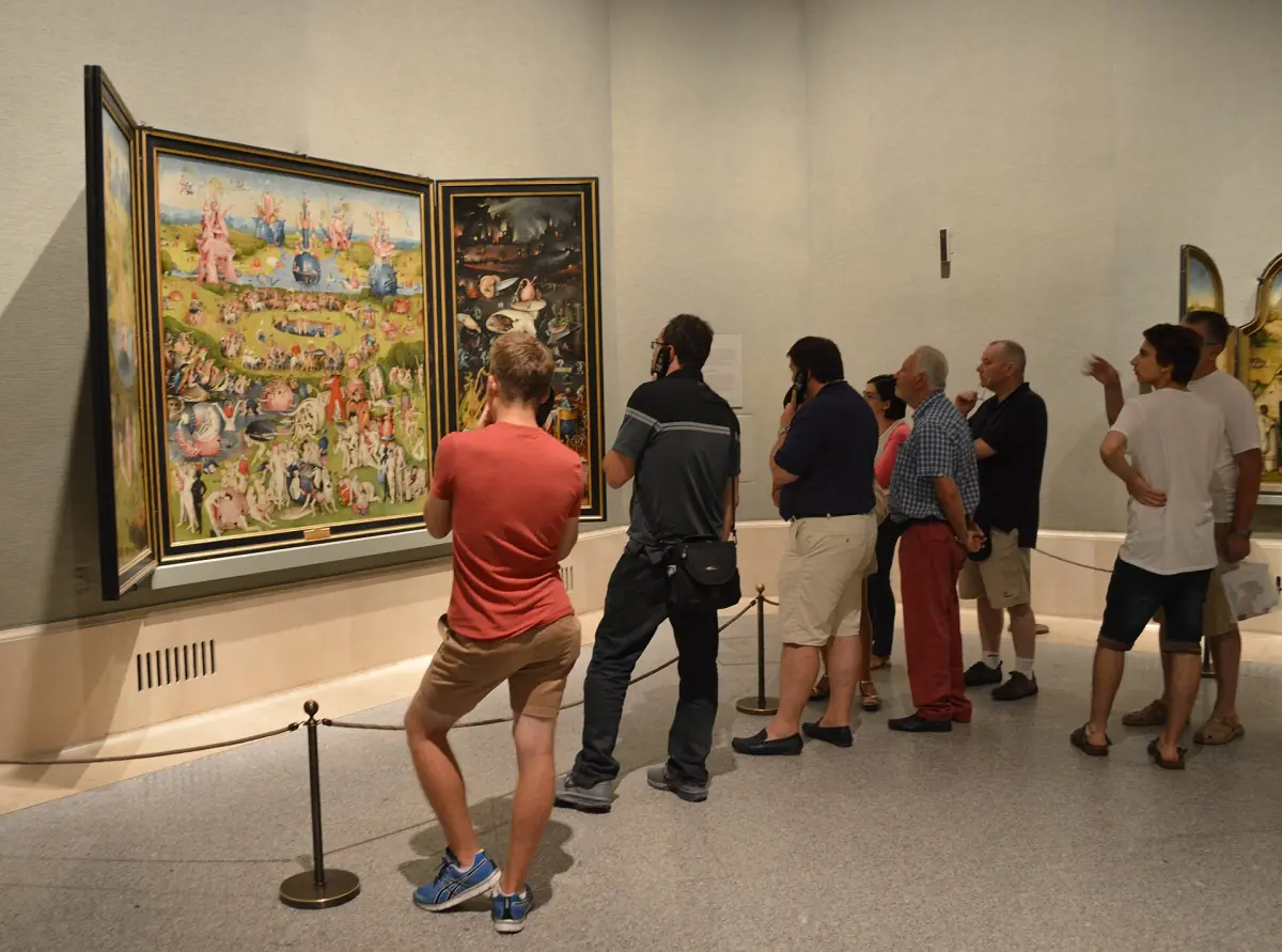 Visitors in front of Bosch's triptych